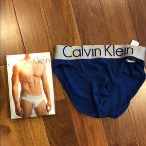 2 pairs of CK briefs 1 med white new 1 sm blue